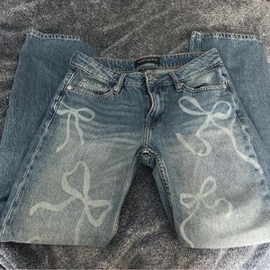 Women's Blue Jeans with Bow Design
